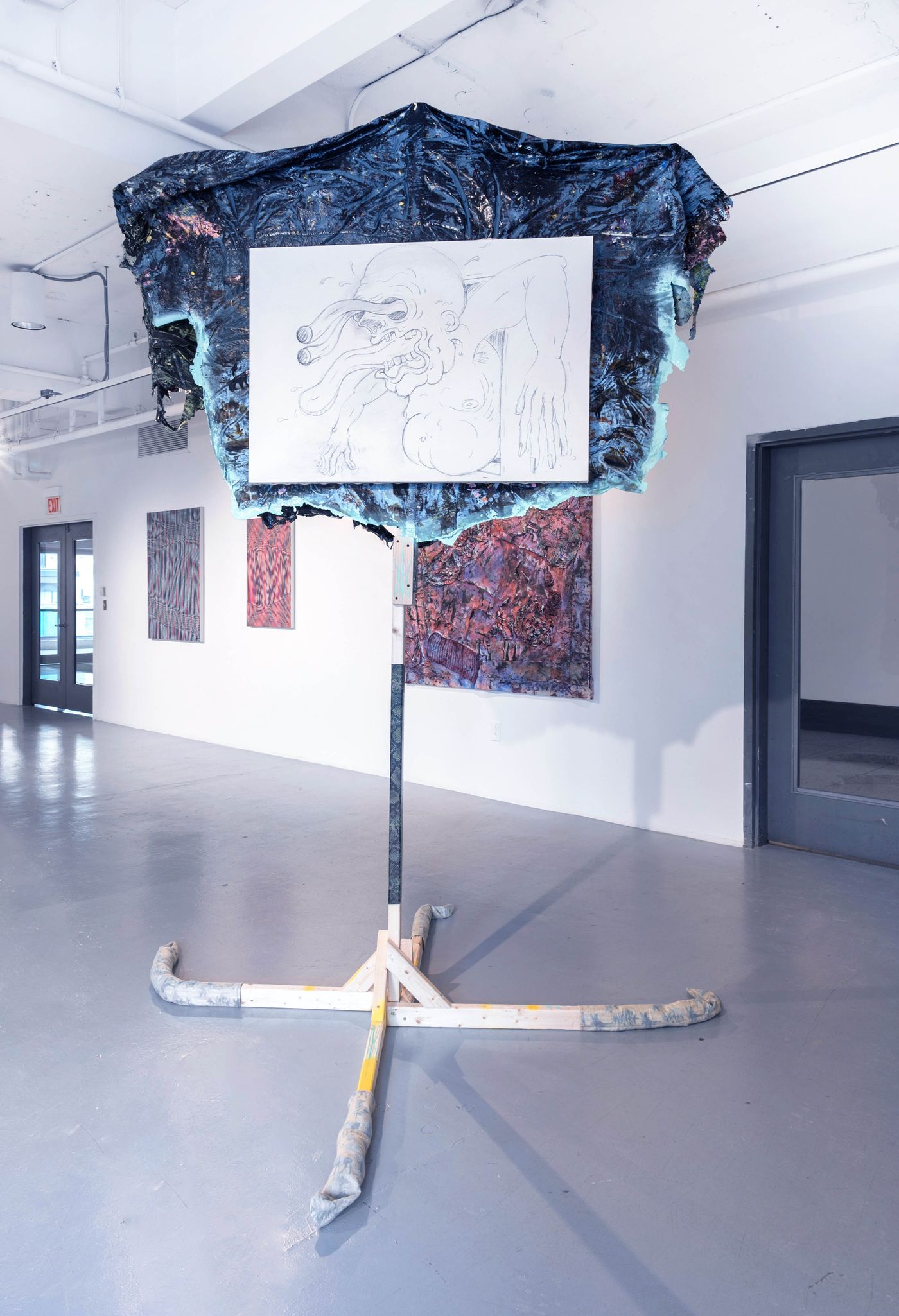 Administrator: 2584, 2021. Wood, flannel, polyester, cotton, yarn, inkjet prints, enamel, charcoal, nails, acrylic latex paint; 114 x 84 x 96 in. Photo: Allison Minto.