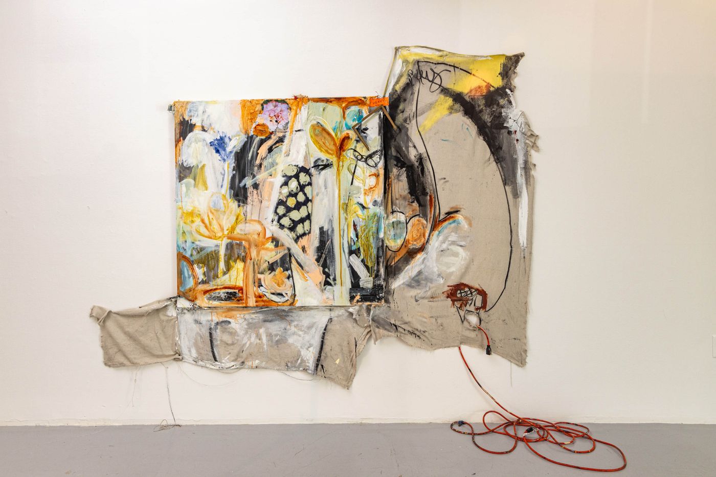 Flowers Are? Love Is? 2021. Oil pastel, charcoal, airplane sticker, tape, broken frame, broken mind, mending heart, saliva, acrylic, tears, joy, military equipment, wine, iodine, bracket on canvas; 108 x 72 in. Photo: Meghan Olson.