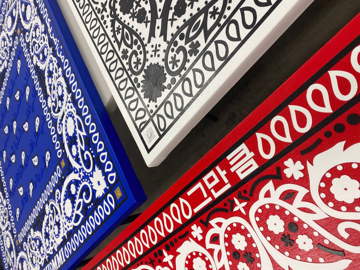 Red, White, and Blue (detail), 2022. Hand-cut and painted illustration board and foil on canvas; 50 x 50 in.