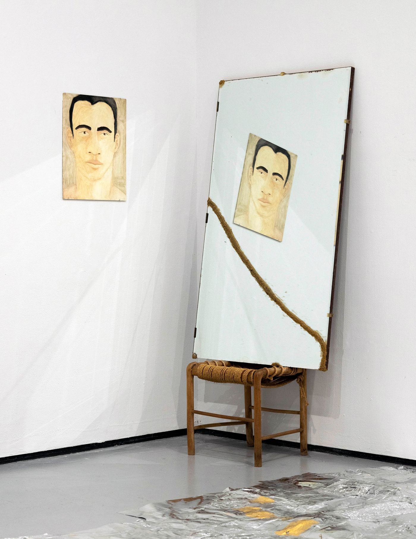 Reflection, 2021. Oil on board; 16 inches x 20 inches. Repaired mirror, sawdust, rope, chair; 36 inches x 72 inches. Photo: Miraj Patel.